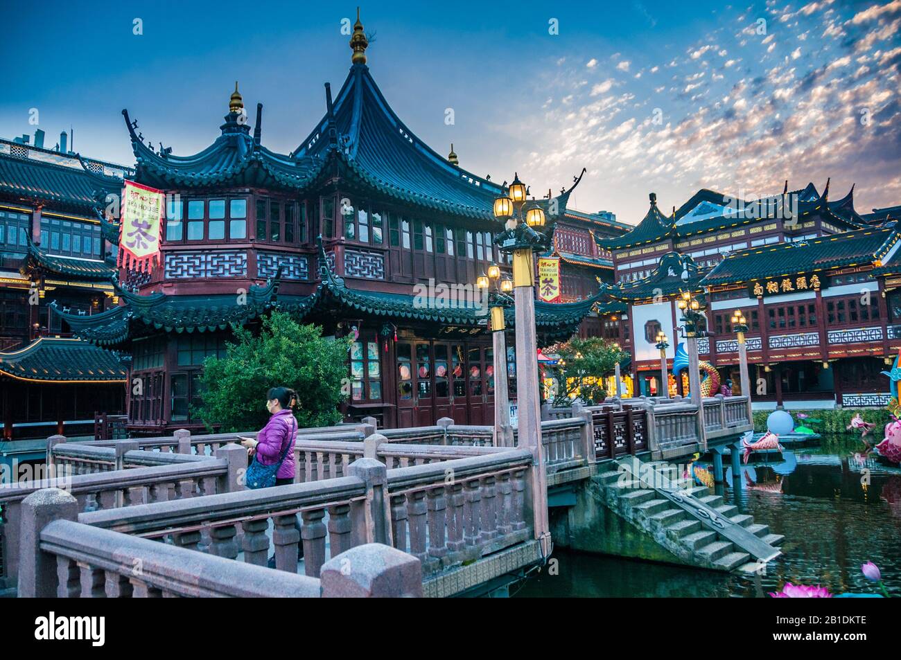 A few tourists brave the coronavirus in front of Huxinting teahouse in Shanghai’s Yuyuan. Stock Photo