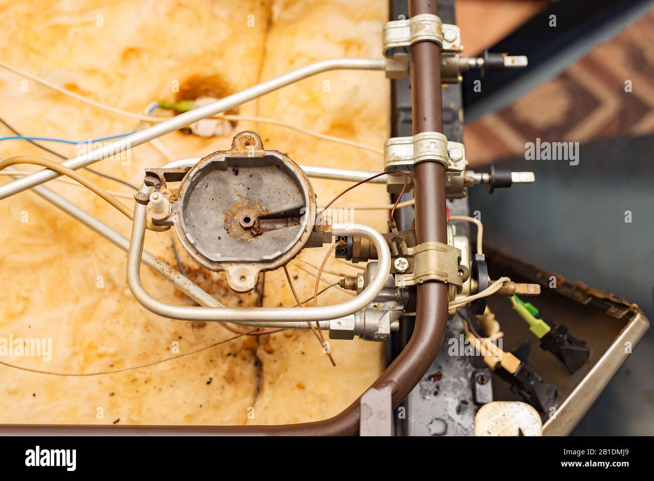 gas stove repair. disassembled old kitchen cooking equipment Stock