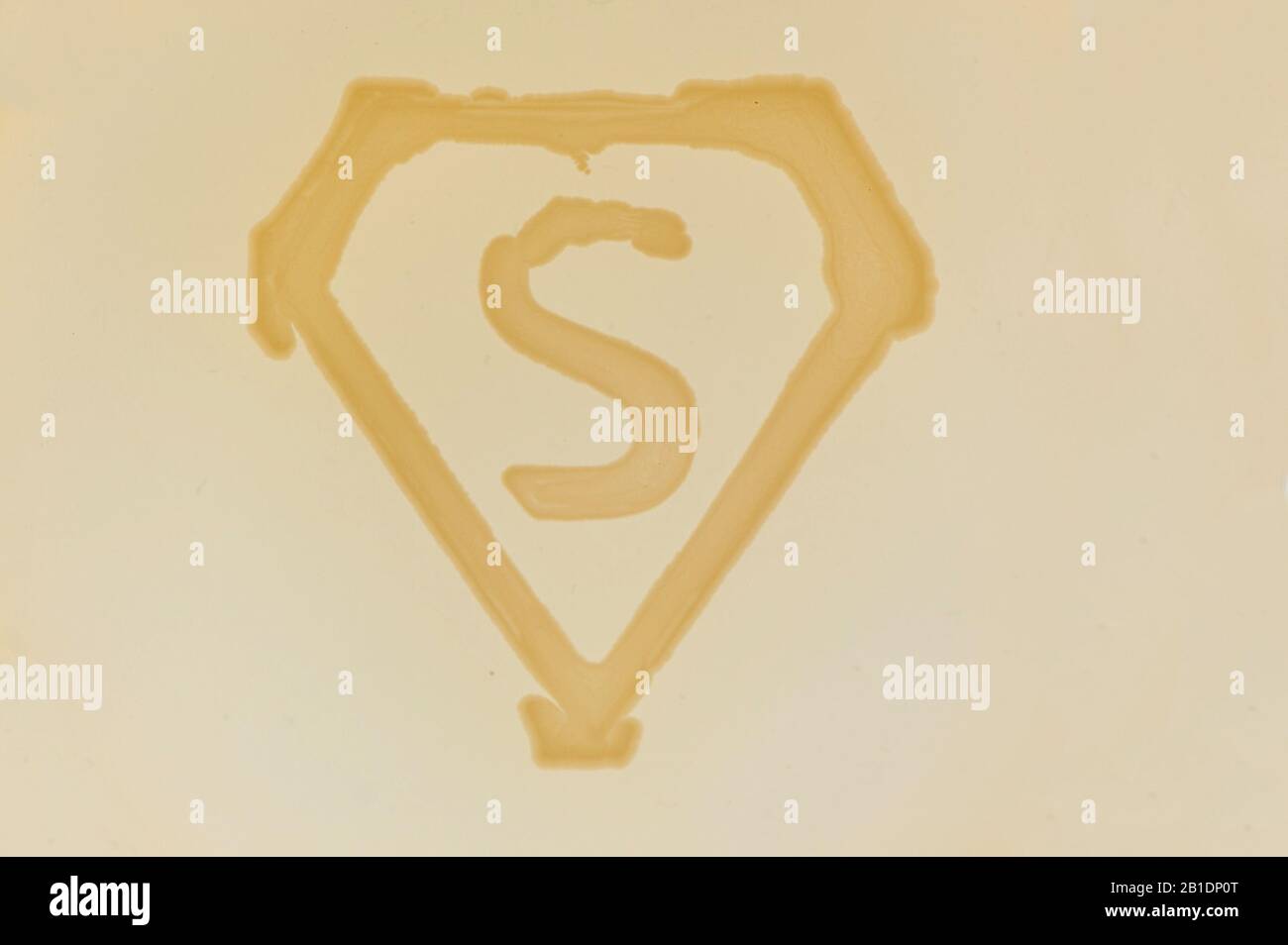 super germ sign made of bacterial culture in shape of letter s Stock Photo