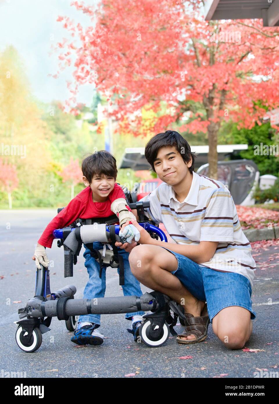 Disabled child walker hires stock photography and images Alamy