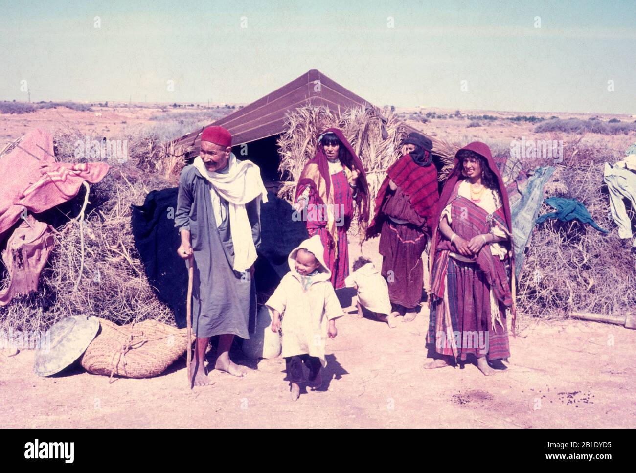 Nomadic Bedouin people by their desert tent in North Africa Stock Photo