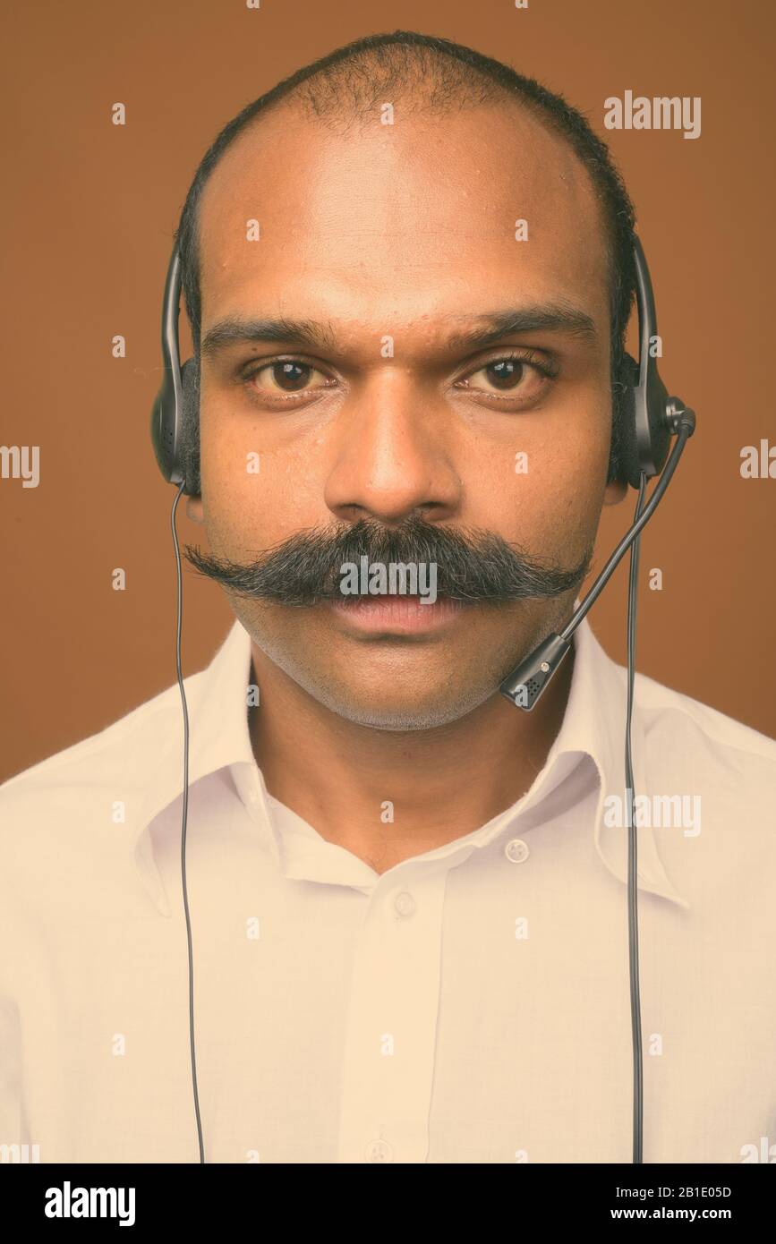 Indian businessman wearing headset hi-res stock photography and images -  Alamy