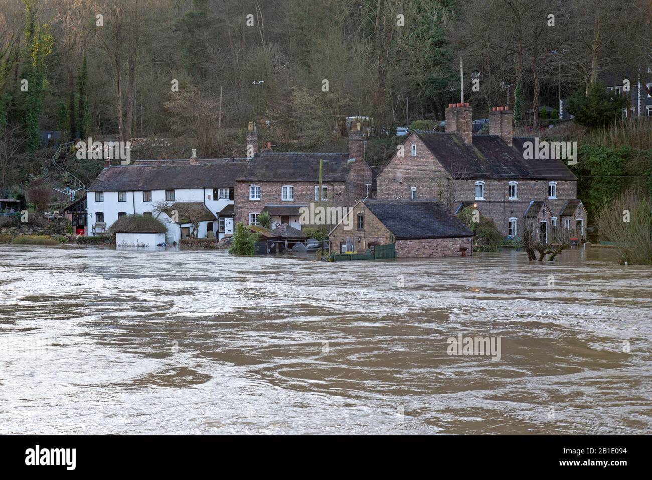 Properties in the Ironbridge Gorge World Heritage Site in Shropshire, England, are once again being flooded, as the River Severn bursts its banks. River levels are predicted to exceed previous highsm and remain high for a couple of days. Stock Photo