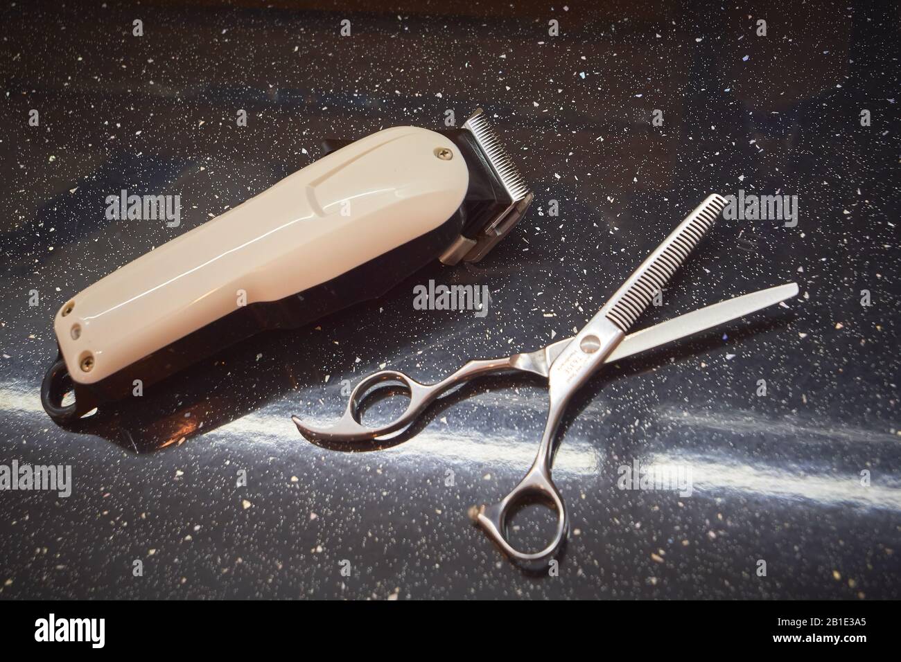 Hair clipper, and trimming scissors, hair cutting tools Stock Photo Alamy