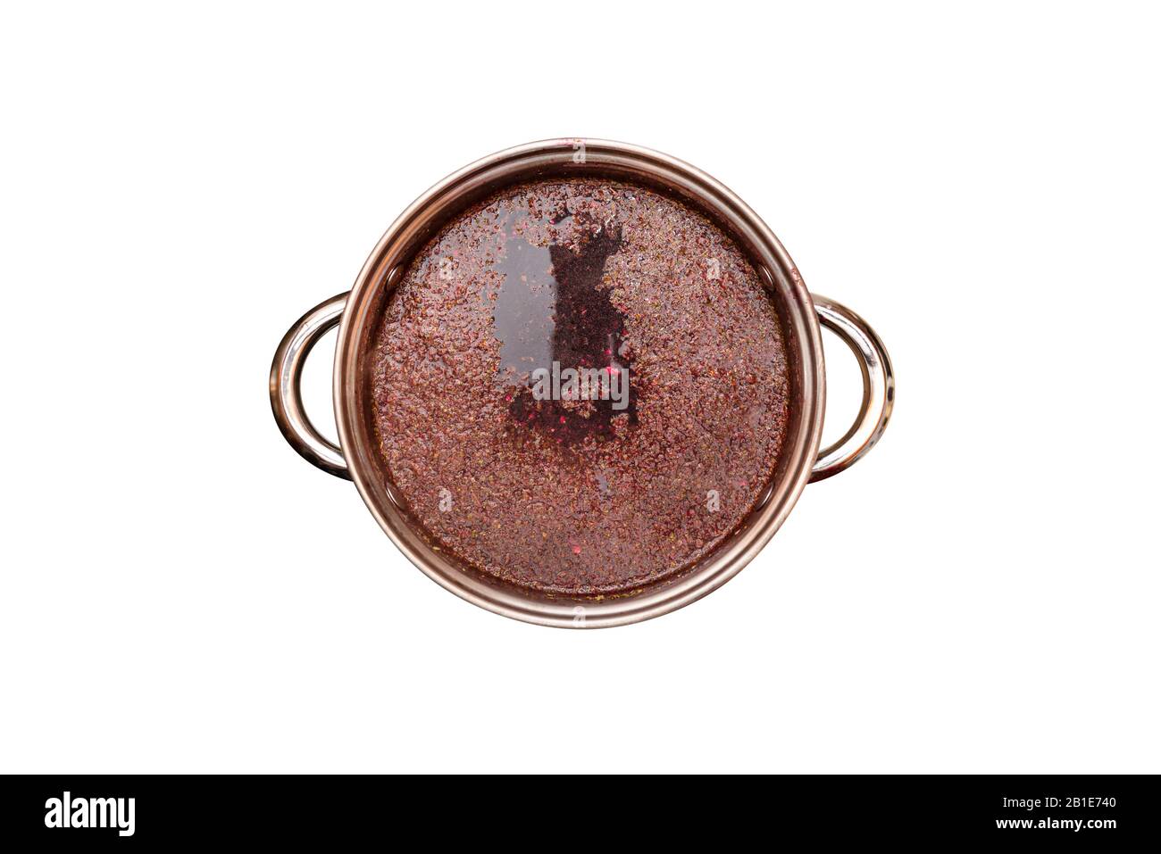 Beet soup in a pot with handles, a flat top view, isolated on a white background with a clipping path. Stock Photo