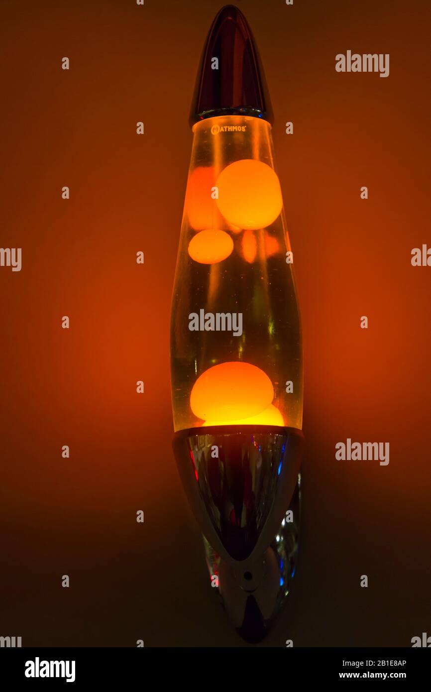 Yellow Lava lamp, lavalamp, on display on wall in Poole Museum for Light Up  Poole, Poole, Dorset UK in February Stock Photo - Alamy