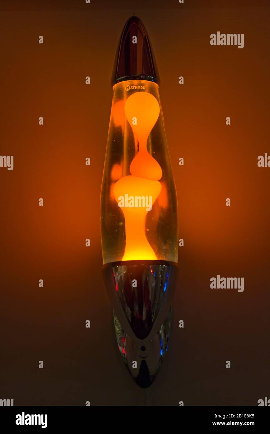 Yellow Lava lamp, lavalamp, on display on wall in Poole Museum for Light Up  Poole, Poole, Dorset UK in February Stock Photo - Alamy