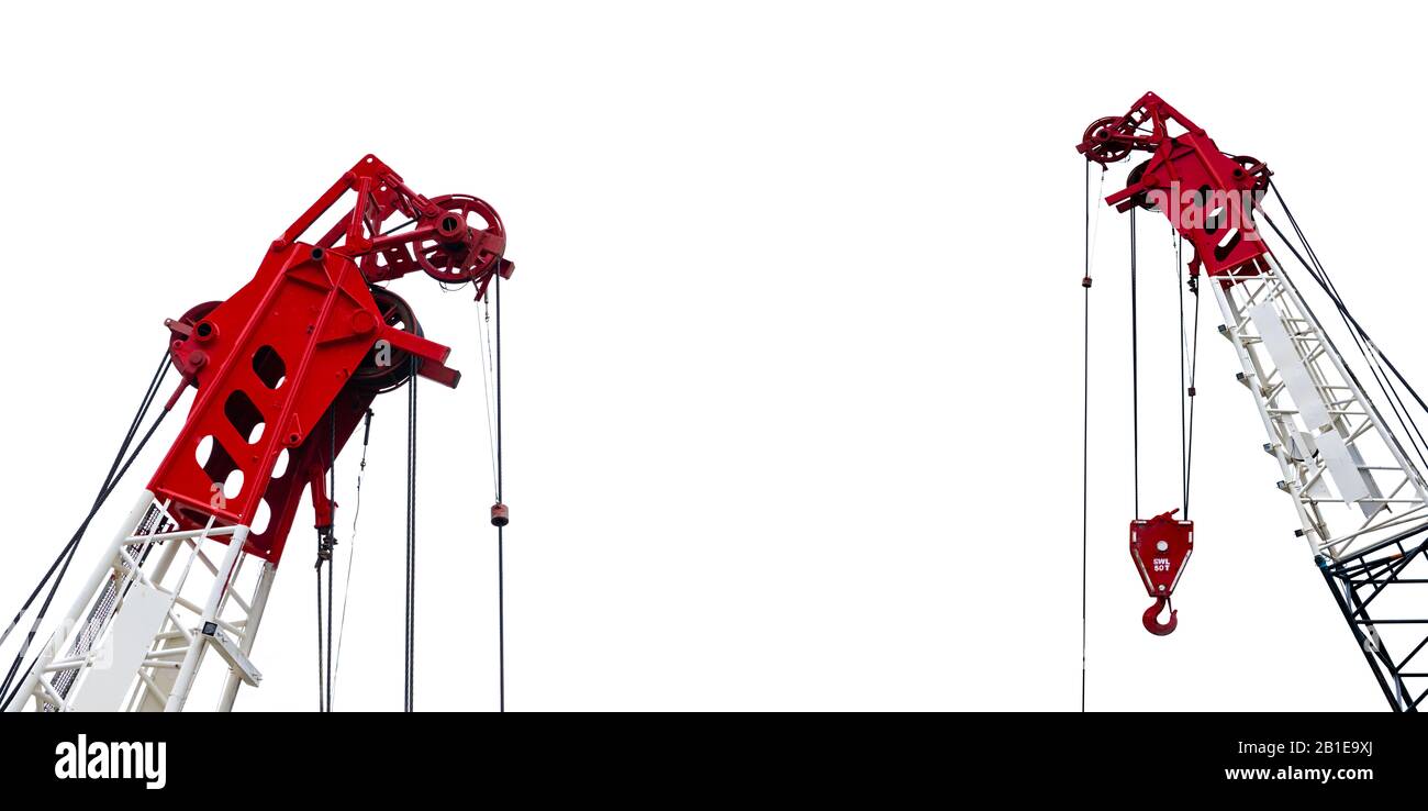 Construction crane for heavy lifting isolated on white background. Construction industry. Crane