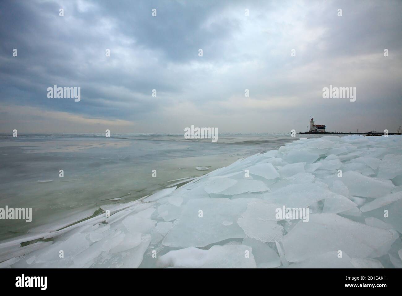 Lighthouse Paard van Marken with drifting ice , Netherlands, Northern Netherlands, Markermeer Stock Photo