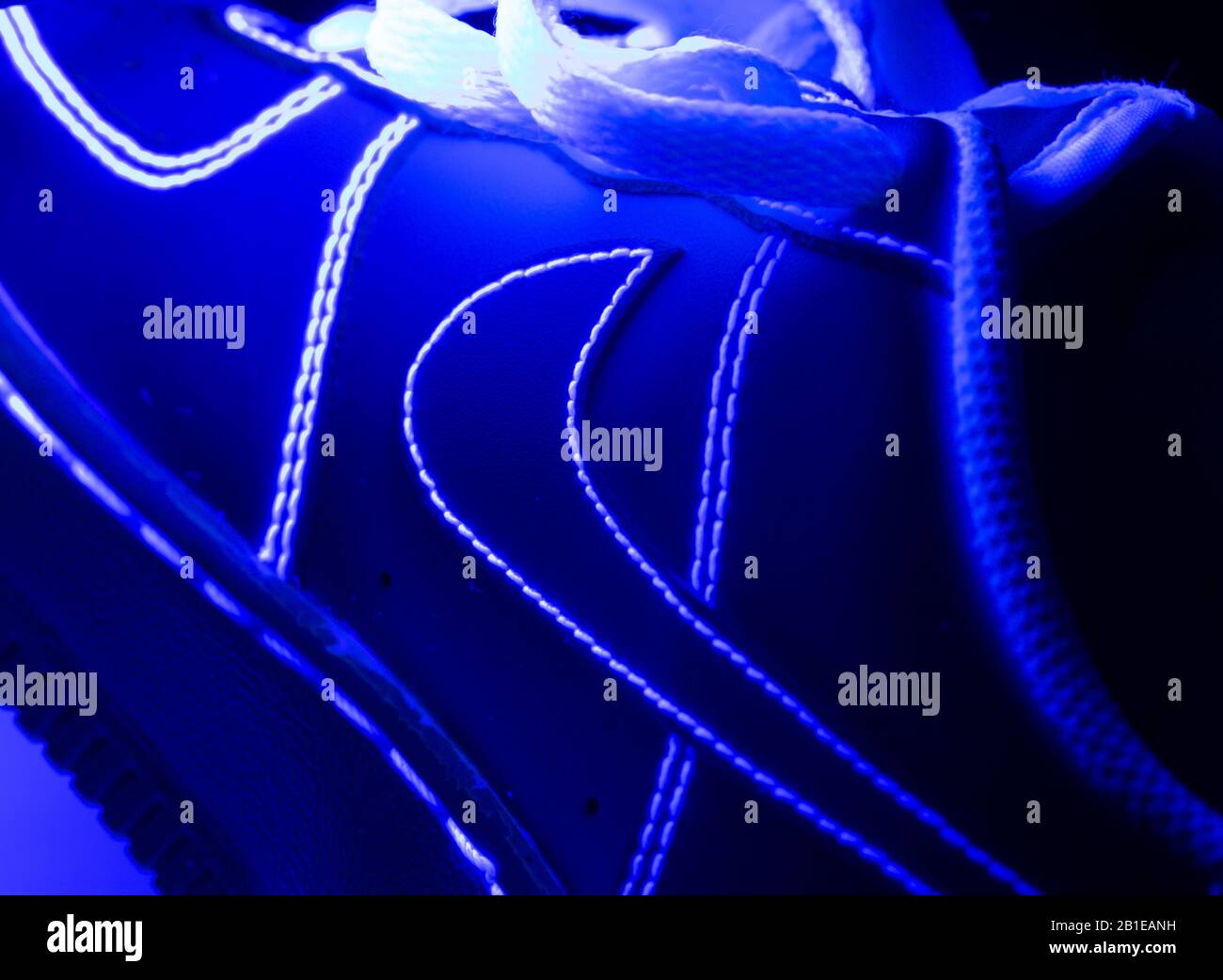 Nike Trainers Under UV Light Stock Photo