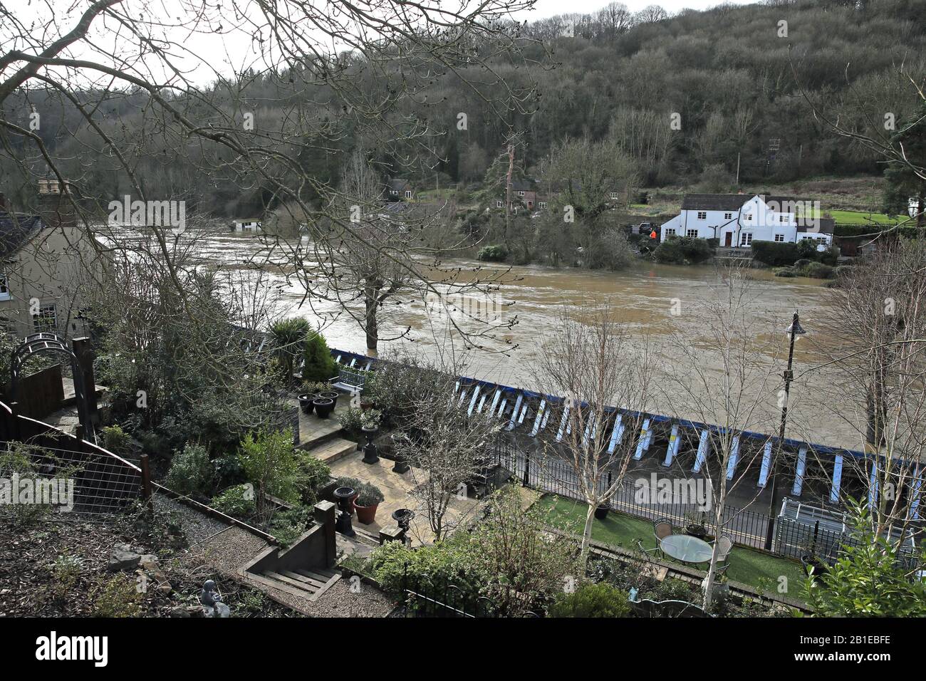 Temporary flood barriers on the Wharfage in Ironbridge, Shropshire, as the River Severn remains high, with warnings of further flooding across the UK. See PA story WEATHER Storm. Photo credit should read: Nick Potts/PA Wire Stock Photo