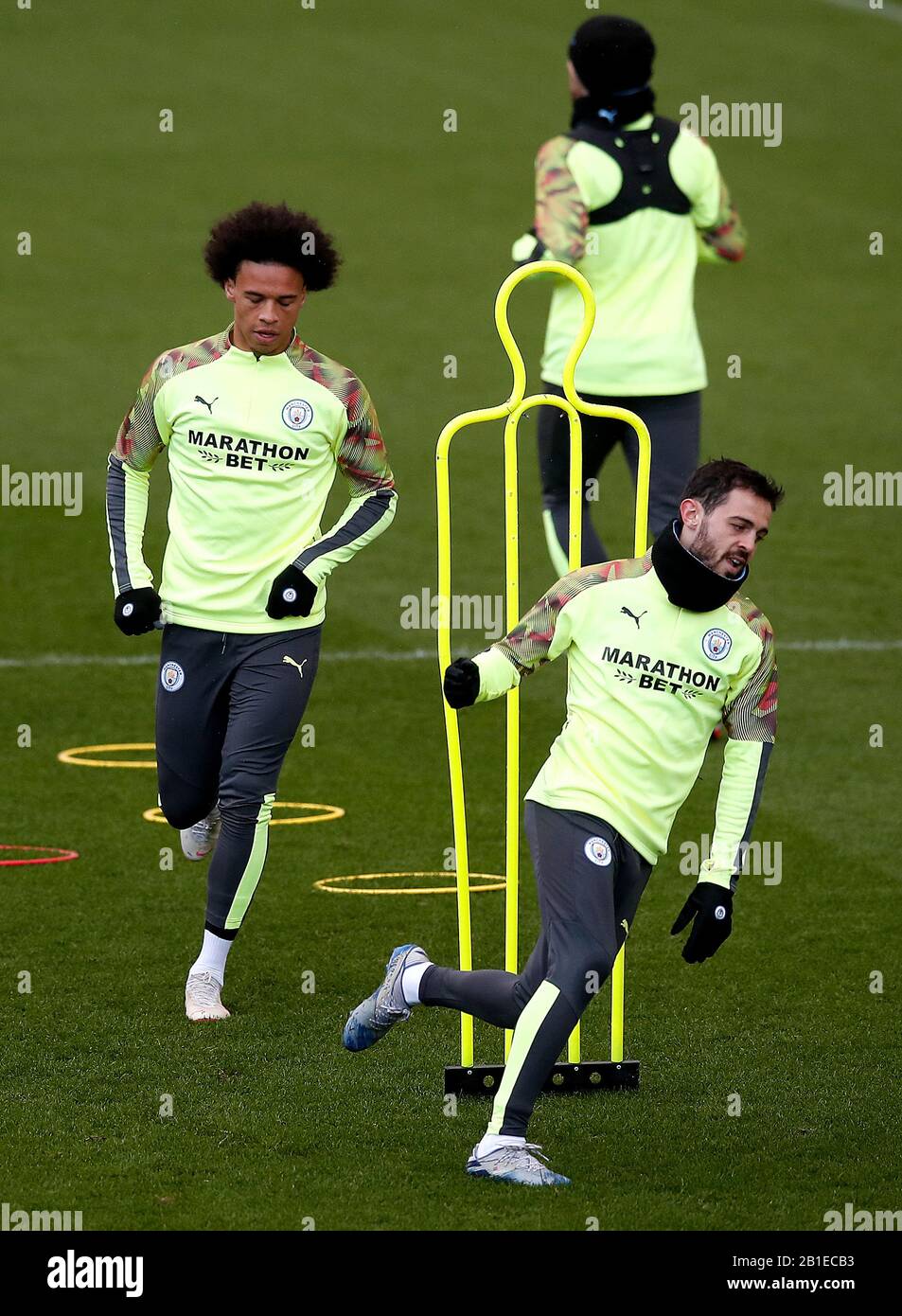 Manchester City's Bernardo Silva (right) and Leroy Sane (left) during