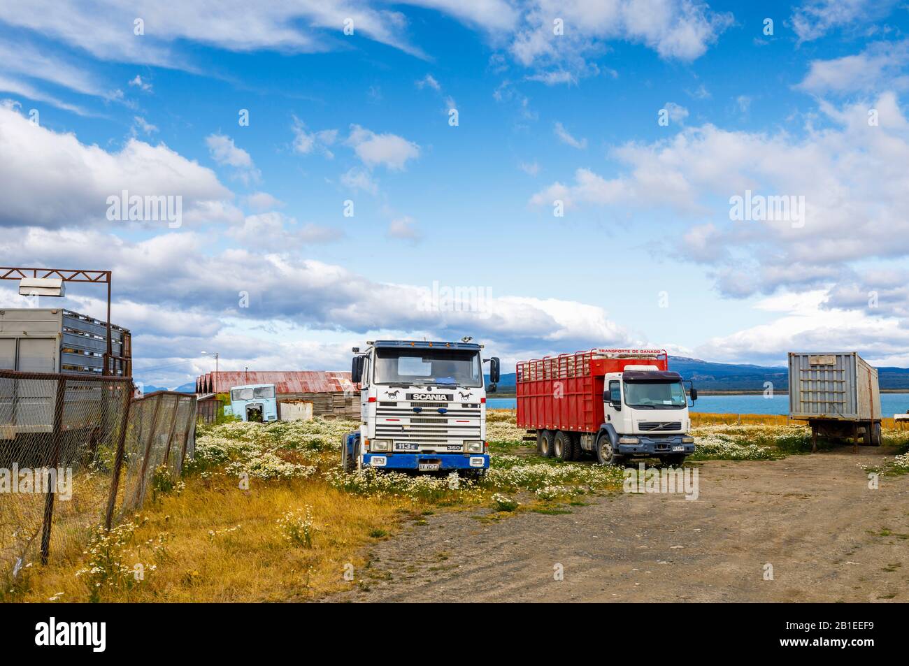 Disused lorries and trailers parked in a field in Puerto Bories, a small village near Puerto Natales, Patagonia , Magallanes Region, southern Chile Stock Photo