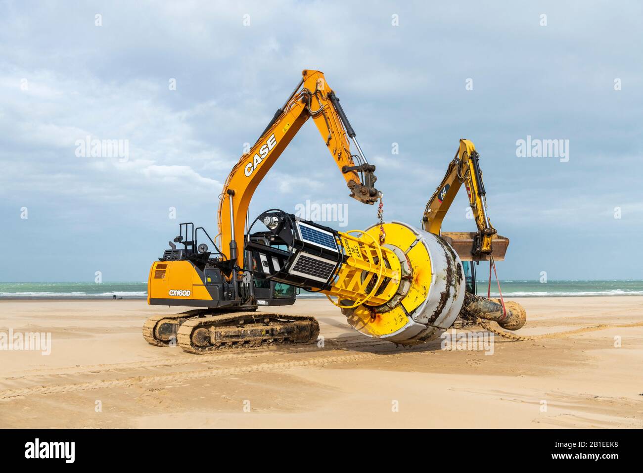 Stranded Buoy Recovery of a cardinal buoy stranded on the beach of Calais, Hauts de ...