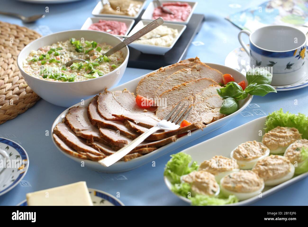 Polish traditional Easter breakfast dishes  on festive table Stock Photo