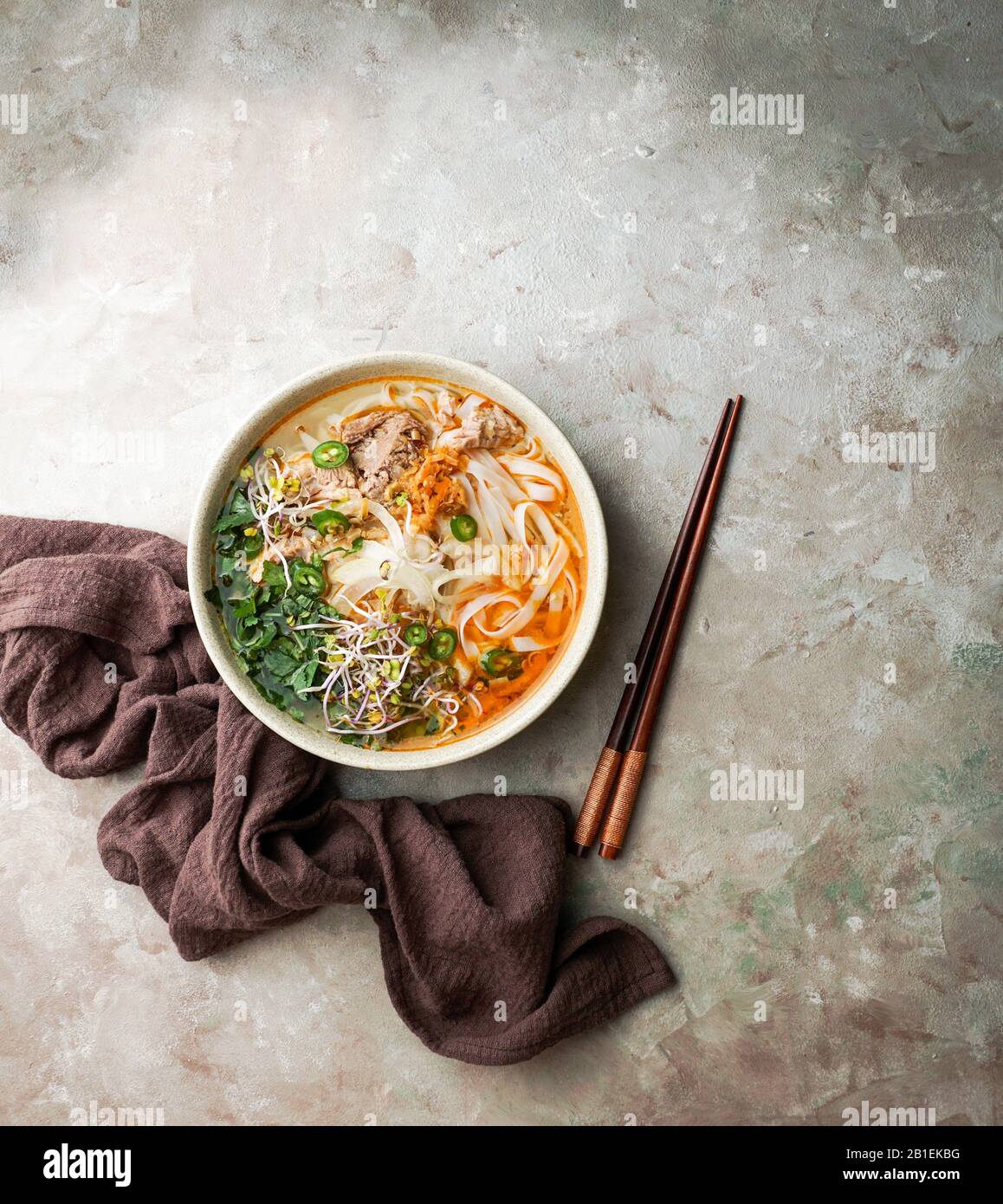 Bun Bo Hue, Bun Bo, Vietnamese beef noodle soup spicy. bowl of beef and