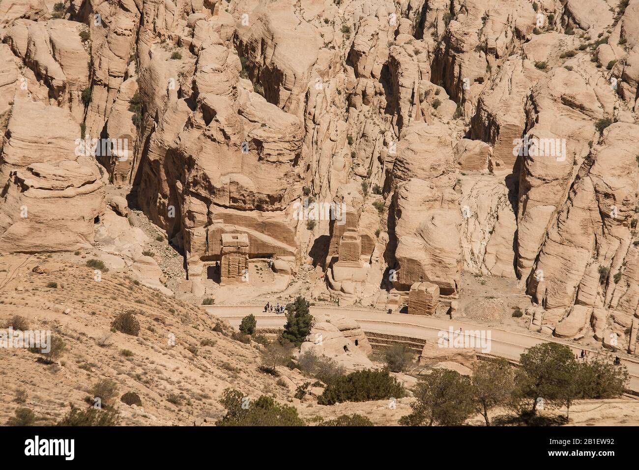 Petra, Jordan, April 30, 2009: A barely seen stone road leading to the ancient city of Petra between desert rock formations. Stock Photo
