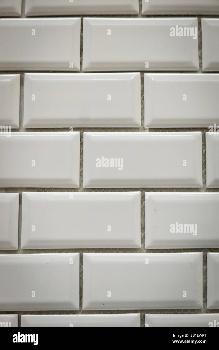 White ceramic bricks on the wall as background. Stock Photo