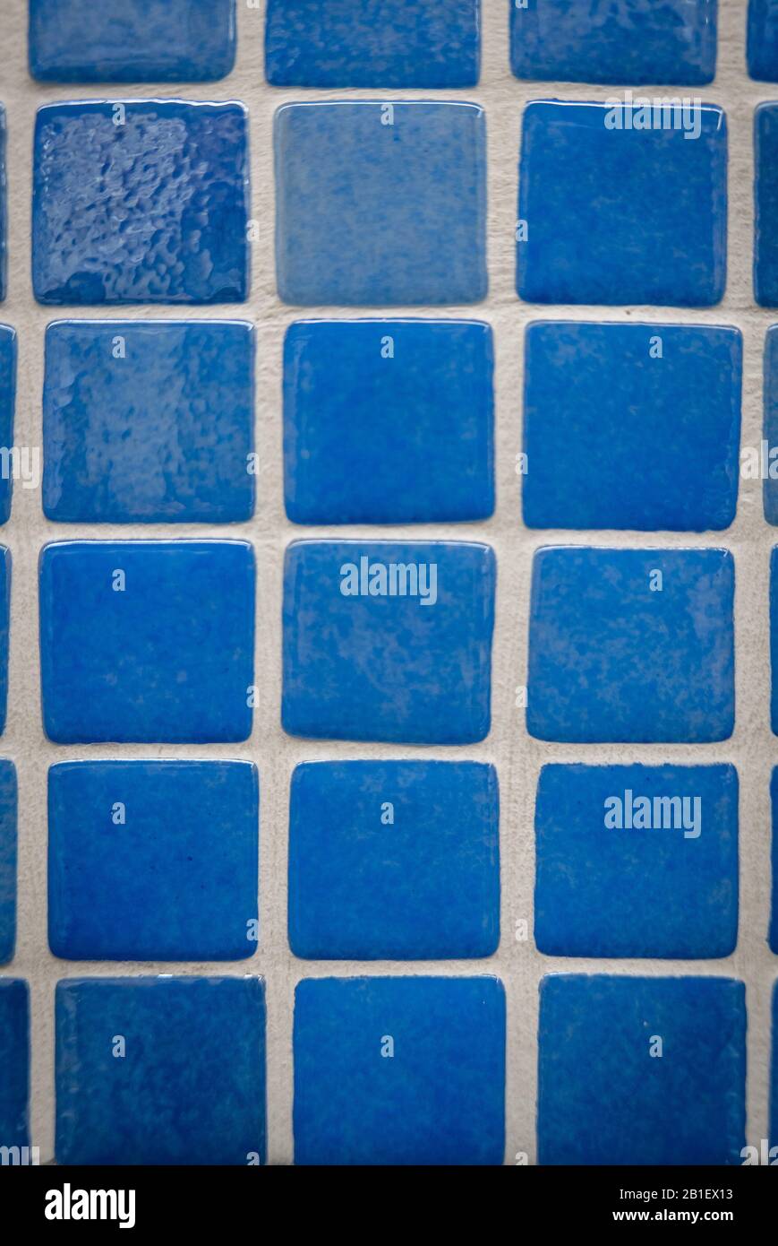 Blue ceramic mosaic on the wall as background Stock Photo - Alamy