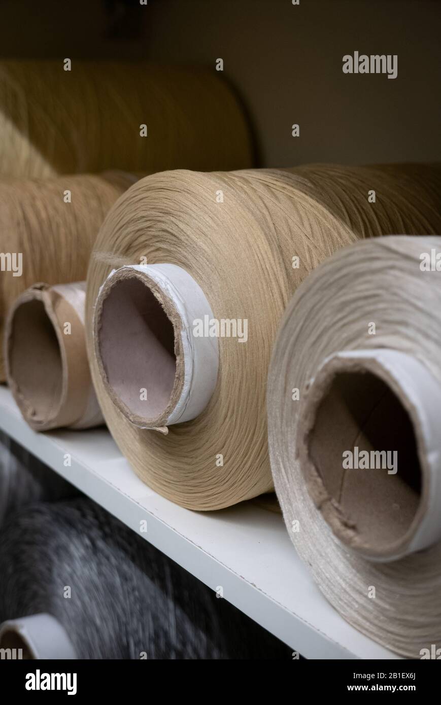 Cotton sewing threaded reels in a sewing shop Stock Photo Alamy