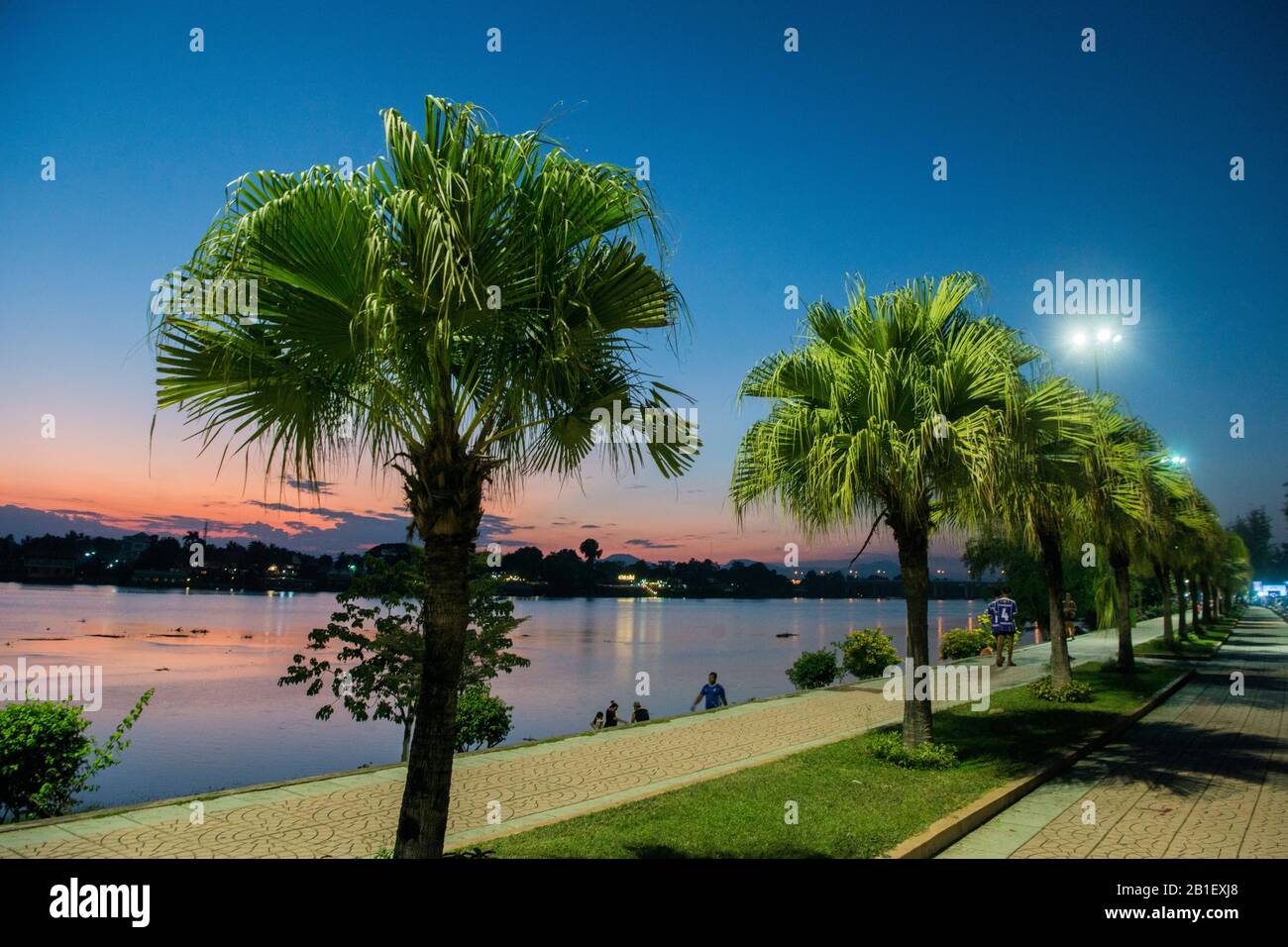 the landscape at the Ping River in the evening in the town of Kamphaeng Phet in the Kamphaeng Phet Province in North Thailand.   Thailand, Kamphaeng P Stock Photo