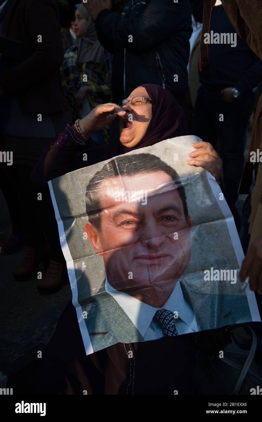 Cairo. 19th Mar, 2017. File photo taken on March 19, 2017 shows a supporter of Hosni Mubarak attending a gathering outside Maadi Military Hospital in Cairo, Egypt. Egyptian former President Hosni Mubarak has died at the age of 91 after suffering a long illness, state-run Nile TV reported on Tuesday. Credit: Meng Tao/Xinhua/Alamy Live News Stock Photo