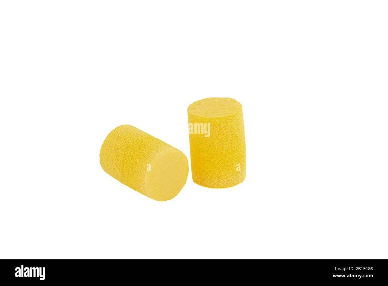 Yellow color ear plugs isolated on white background Stock Photo