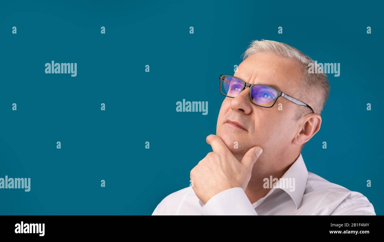 Pensive creative senior old man hi-res stock photography and images - Alamy