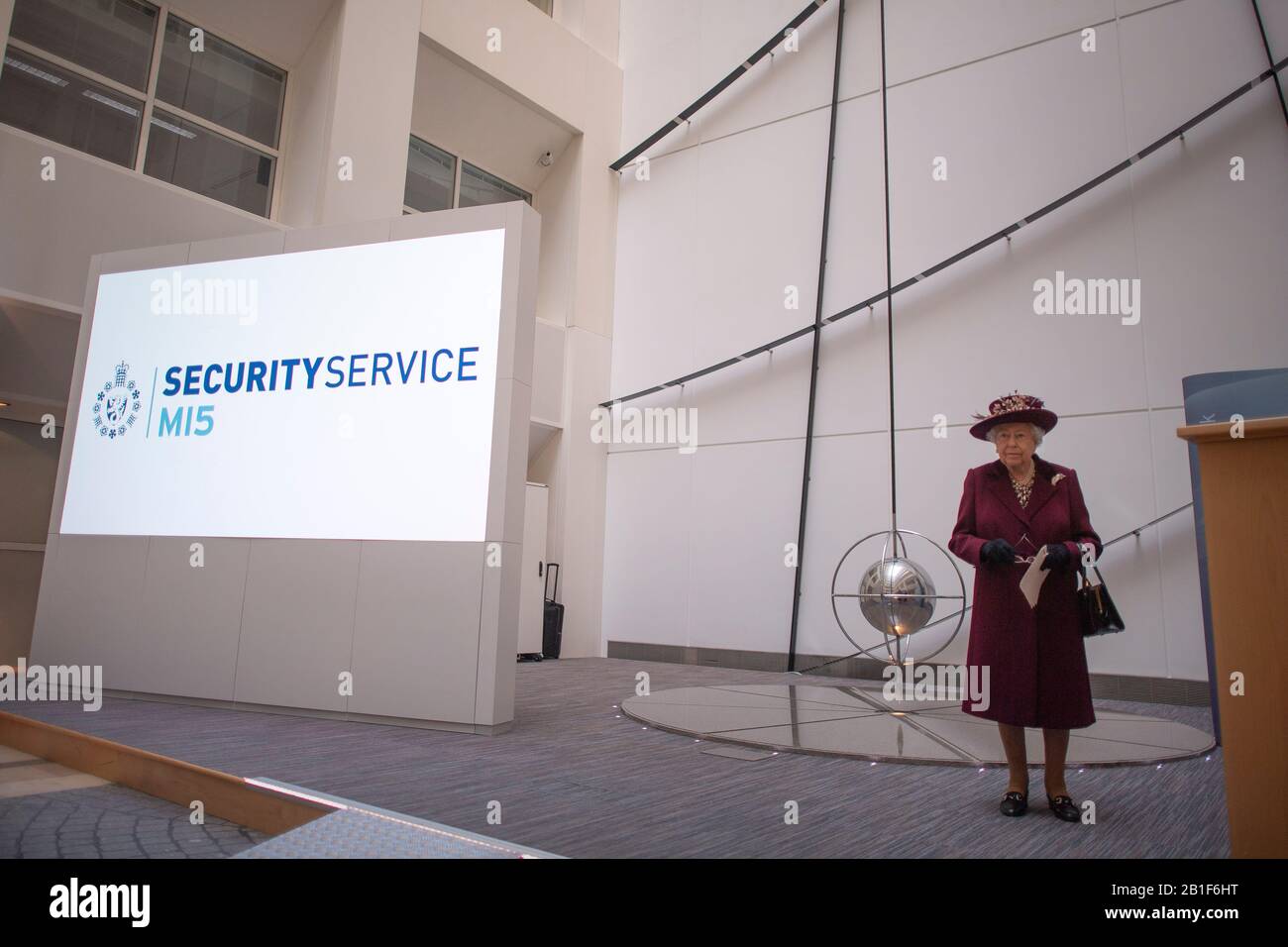 Queen Elizabeth II during a visit to the headquarters of MI5 at Thames House in London. Stock Photo