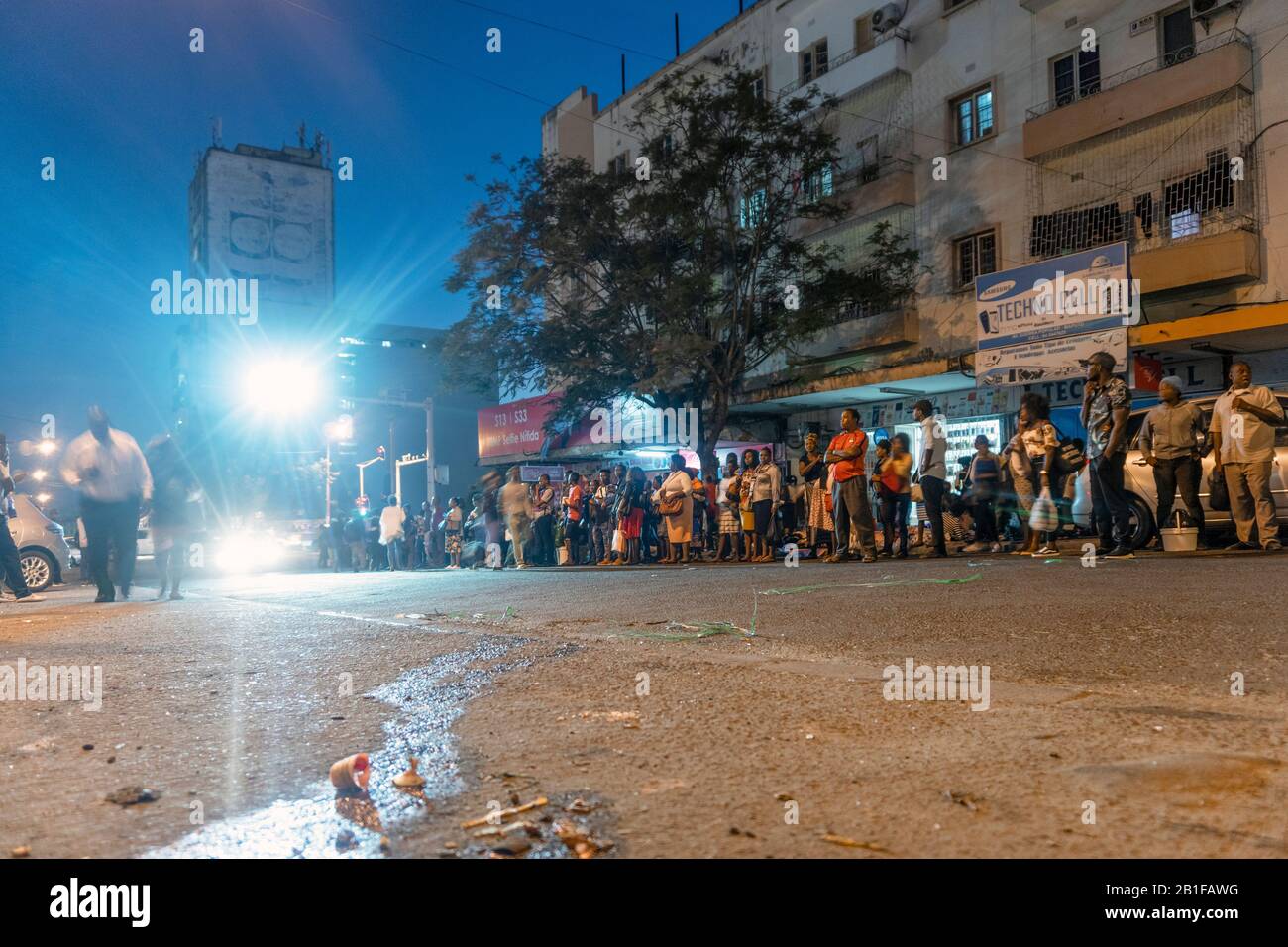 Maputo, Mozambique - May 15, 2019: Many local people waiting for a bus in the capital city Stock Photo