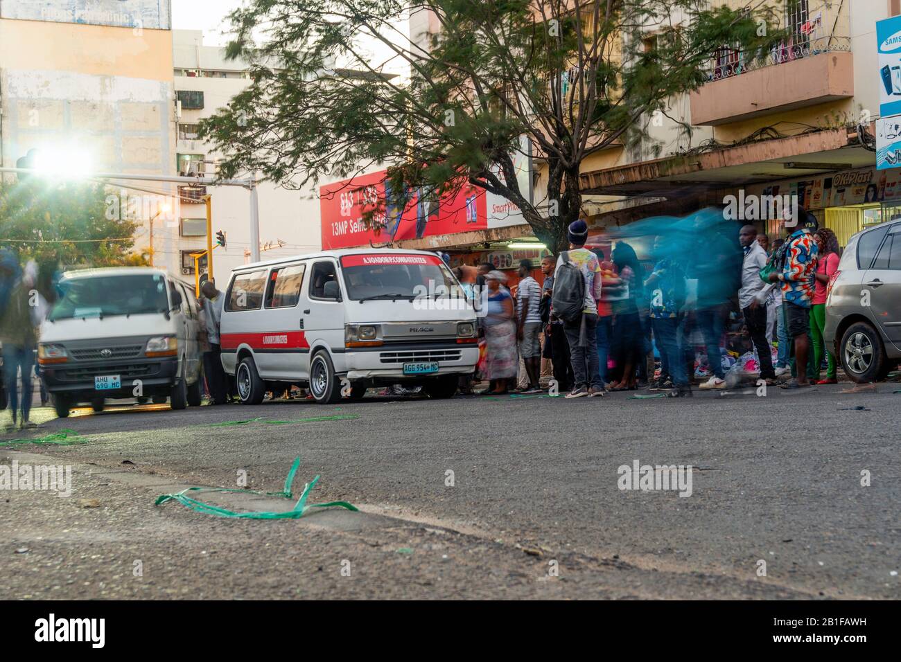 Maputo, Mozambique - May 15, 2019: Many local people entering a bus in the capital city Stock Photo