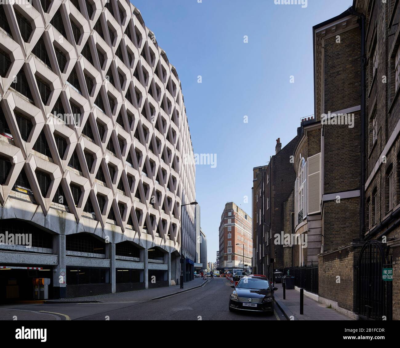 View along entrance facade on Marylebone Lane. Welbeck Street Car Park, London, United Kingdom