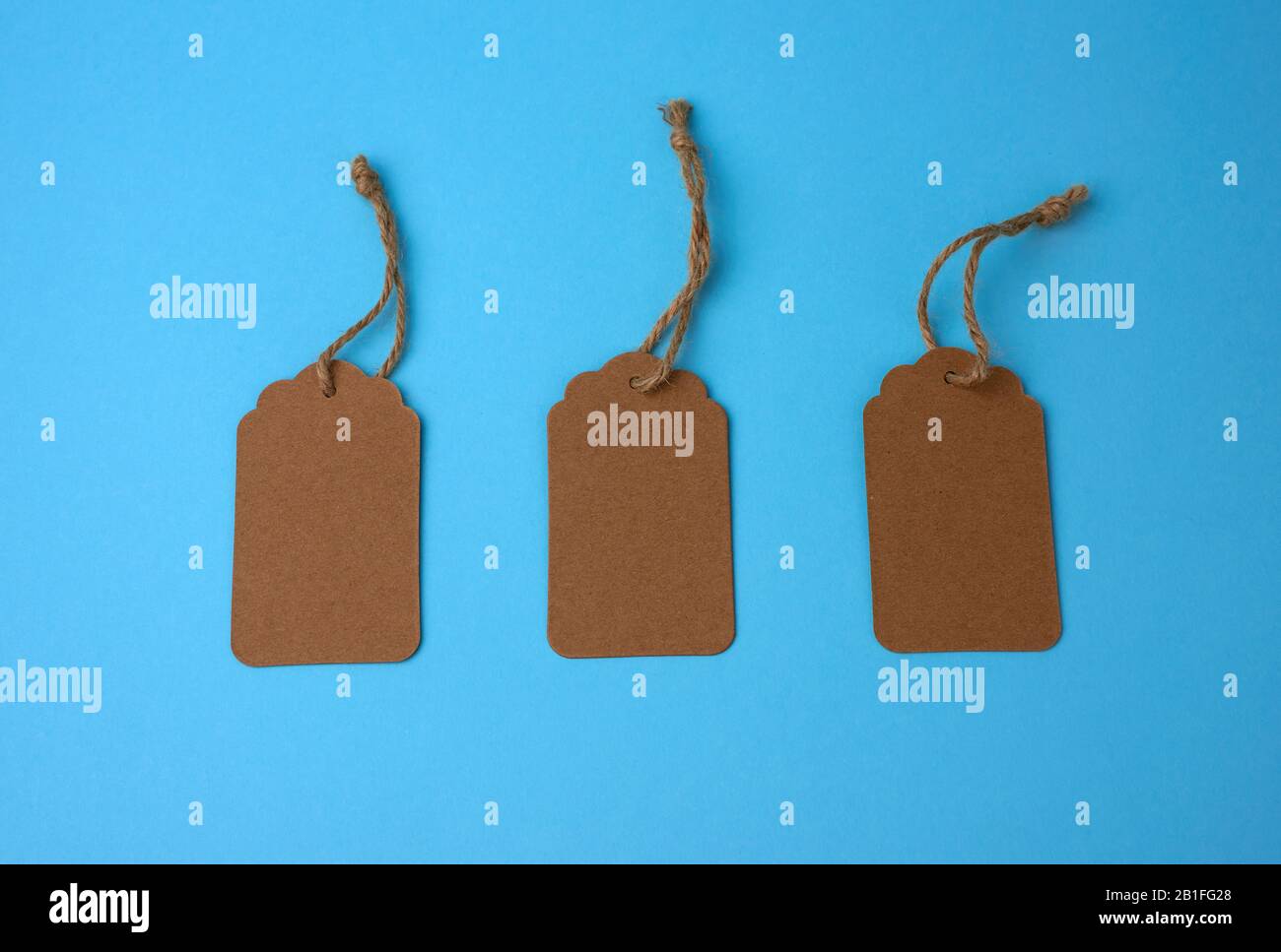 Blank brown price tags hanging hi-res stock photography and images - Alamy