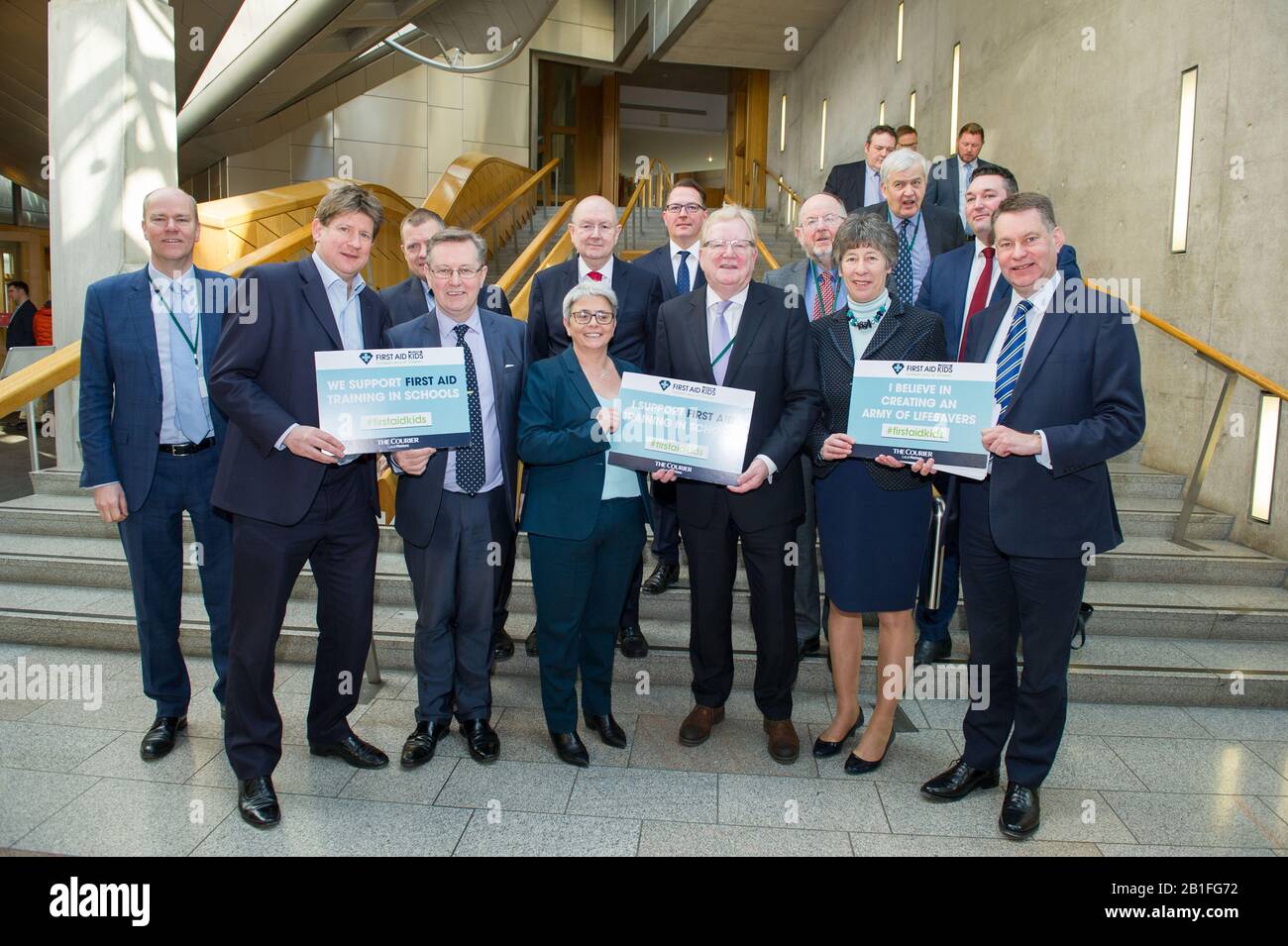 Edinburgh, UK. 25th Feb, 2020. Pictured: (centre) Jackson Carlaw MSP - Leader of the Scottish Conservative and Unionist Party, along with fellow party members. A photo call in the Scottish Parliament for supporting first aid training in schools for kids. Credit: Colin Fisher/Alamy Live News Stock Photo