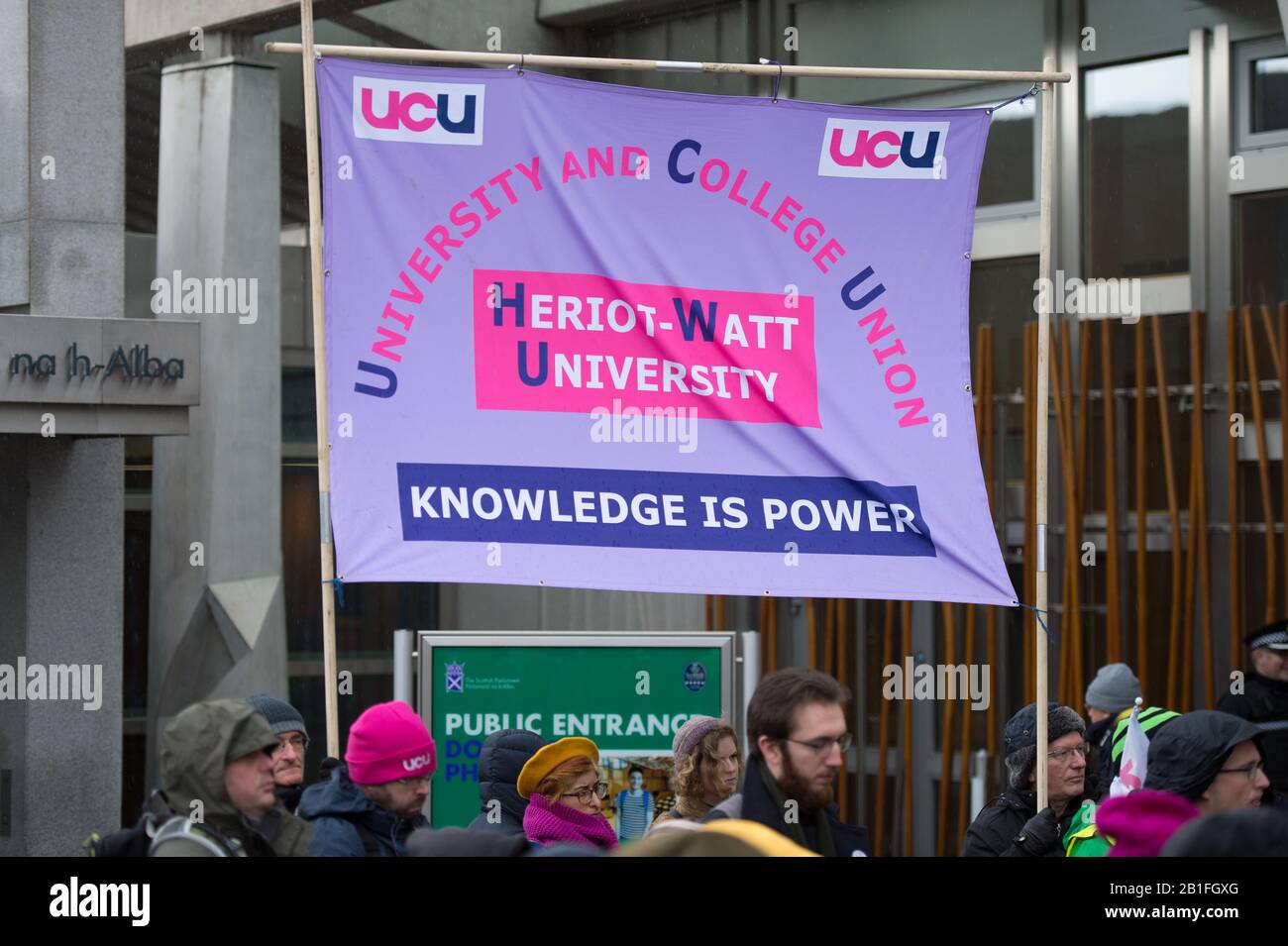 Edinburgh, UK. 25th Feb, 2020. Pictured: Protest outside of the Scottish Parliament, where students are protesting against the draconian measures put in place over higher education pay, pensions and working conditions by the universities. Credit: Colin Fisher/Alamy Live News Stock Photo
