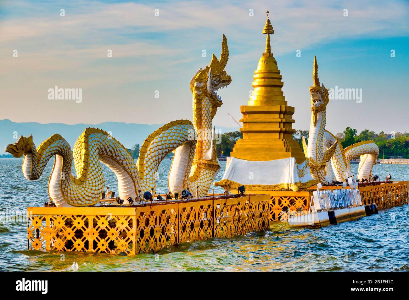 Twin golden dragons on Kwan Phayao, Phayao, Thailand Stock Photo