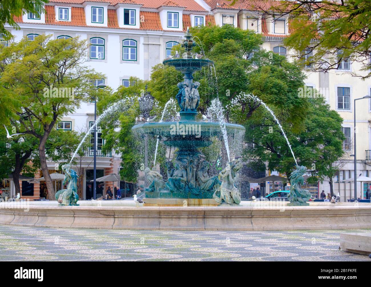 Fountain in a public garden Stock Photo - Alamy