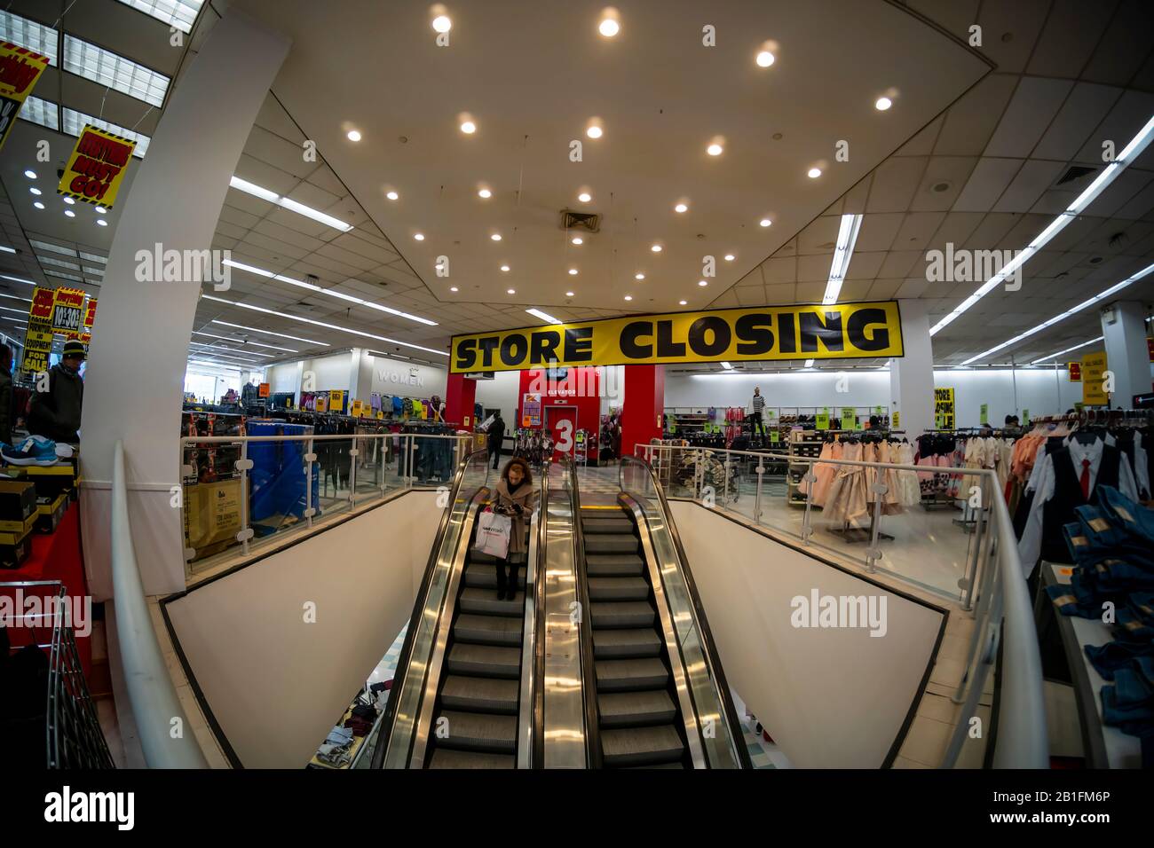 Store closing signs are seen plastered all over the Penn Station Kmart