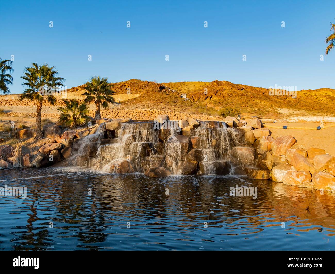 Sunset view of a beautiful waterfall of Lake Las Vegas at Nevada Stock ...
