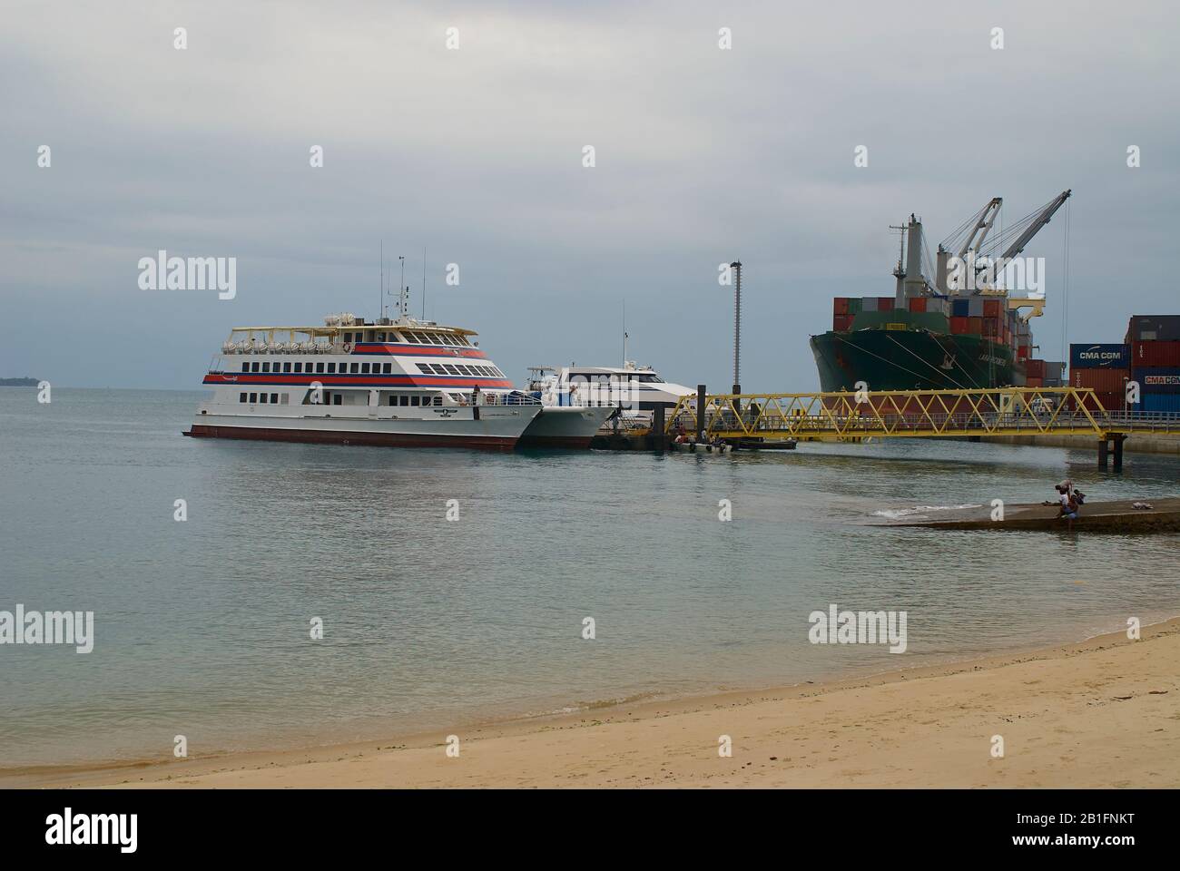 Catamaran ferries from Dar es Salaam, moored at the ferry pier in Zanzibar, Tanzania Stock Photo Catamaran ferries from Dar es Salaam, moored at the ferry pier in Zanzibar, Tanzania Stock Photo