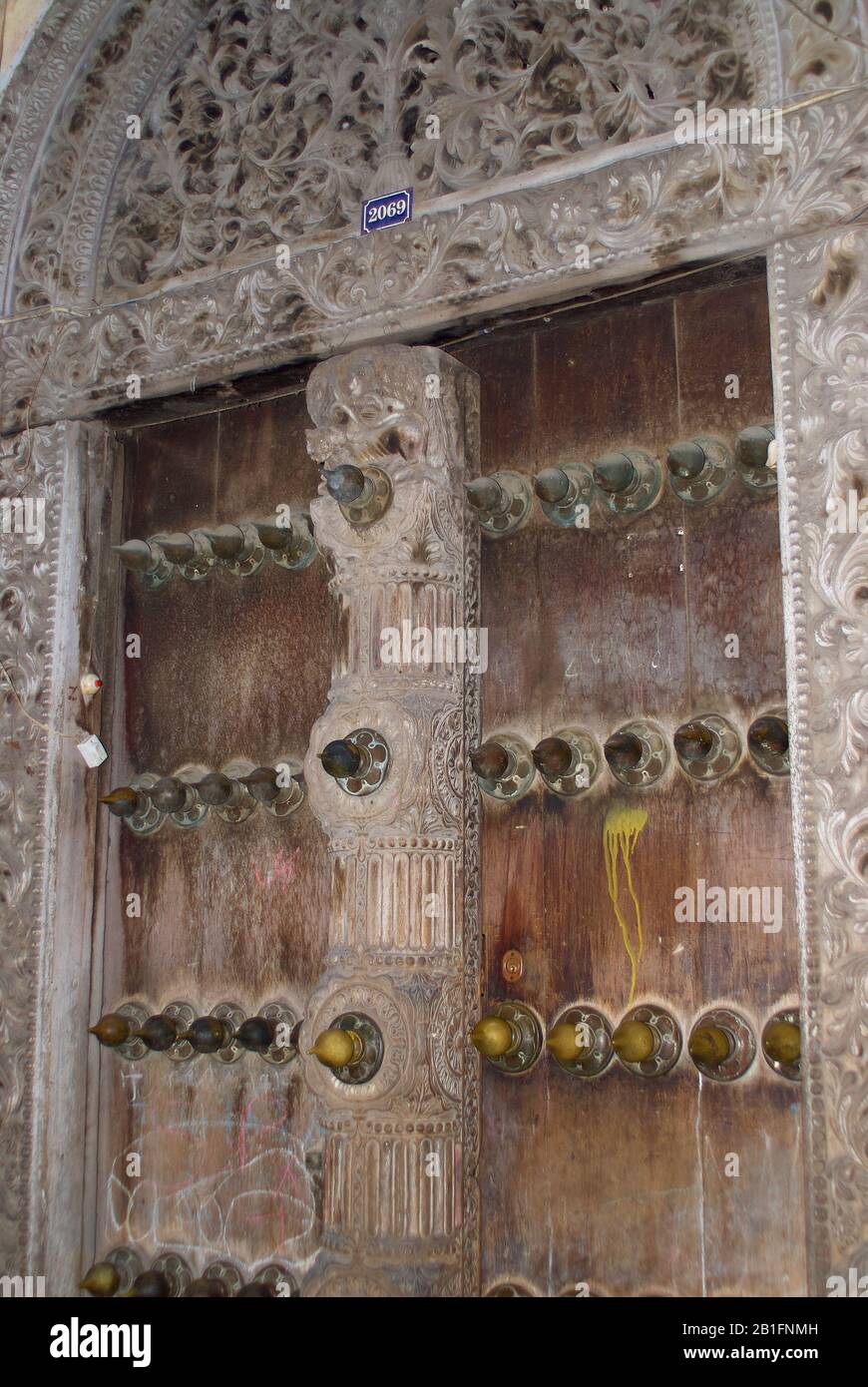 Carved wooden 'Zanzibar'-doors, Stonetown Zanzibar, Tanzania Stock Photo