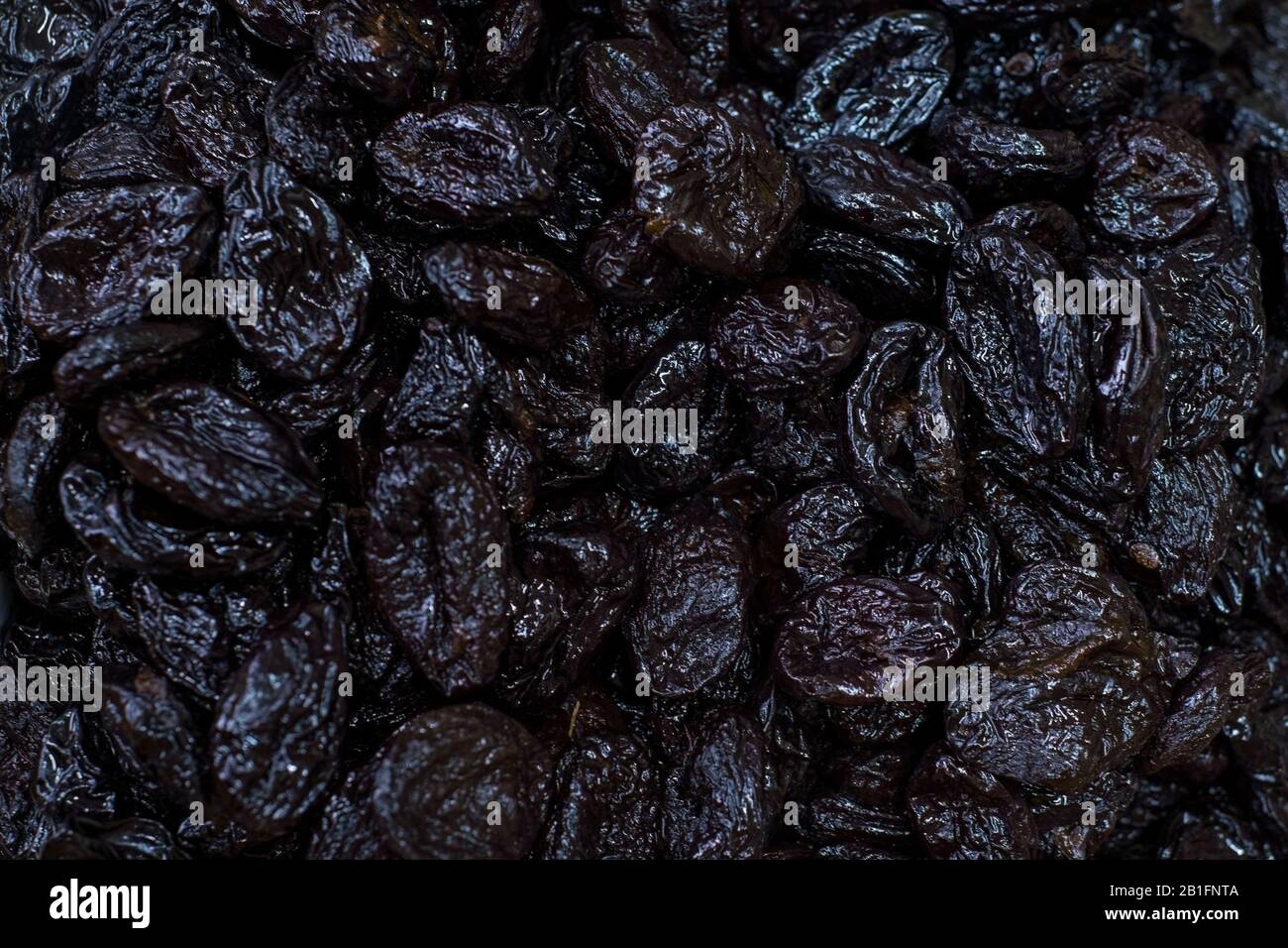 Prune in closeuptop view texture of prune fruits. Healthy nutrition