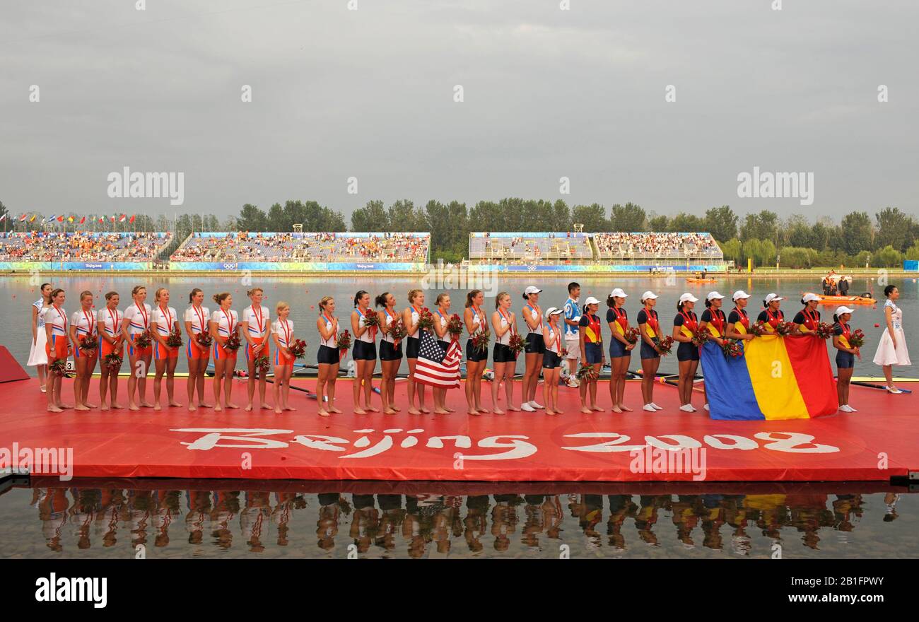Shunyi, CHINA. Medal Presentation.  Women's Eights. left to right, NED W8+ silver medalist, Centre USA W8+ Gold Medalist and Bronze medalist ROM W8+2008 Olympic Regatta, Shunyi Rowing Course.  Sun 17.08.2008.  [Mandatory Credit: Peter SPURRIER, Intersport Images, centre; Gold medalist CHN W4X left to right  Bin Tang, Jin Ziwei, Aihua Xi, Yangyang Zhang), Left; Silver medalist GBR W4X Annie VERNON, Debbie FLOOD, Frances HOUGHTON and Katerine GRAINGER, right;  Bronze  medalist  GER W4X left to right Britta Oppelt, Manuela Lutze, Kathrin Boron, Stephanie Schiller) Stock Photo