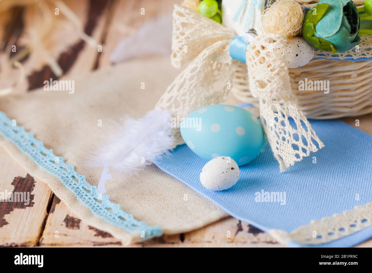 Macro ceramic Easter egg on blue napkin Stock Photo