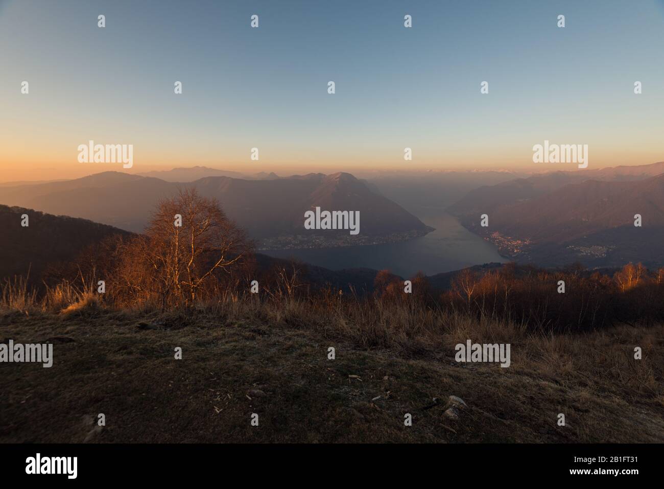 sunset landscape from Monte Boletto during a sunny winter day, Brunate, Como, Italy Stock Photo