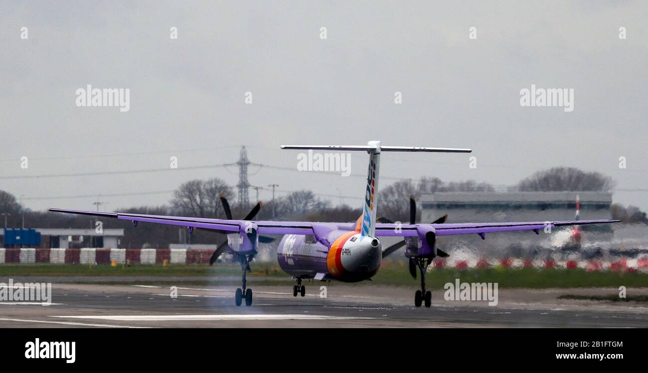 De Havilland Canada Dash 8-400 (G-PRPH) owned and operated by Flybe lands at Heathrow Airport. PA Photo. Picture date: Tuesday February 25, 2020. See PA story . Photo credit should read: Steve Parsons/PA Wire Stock Photo