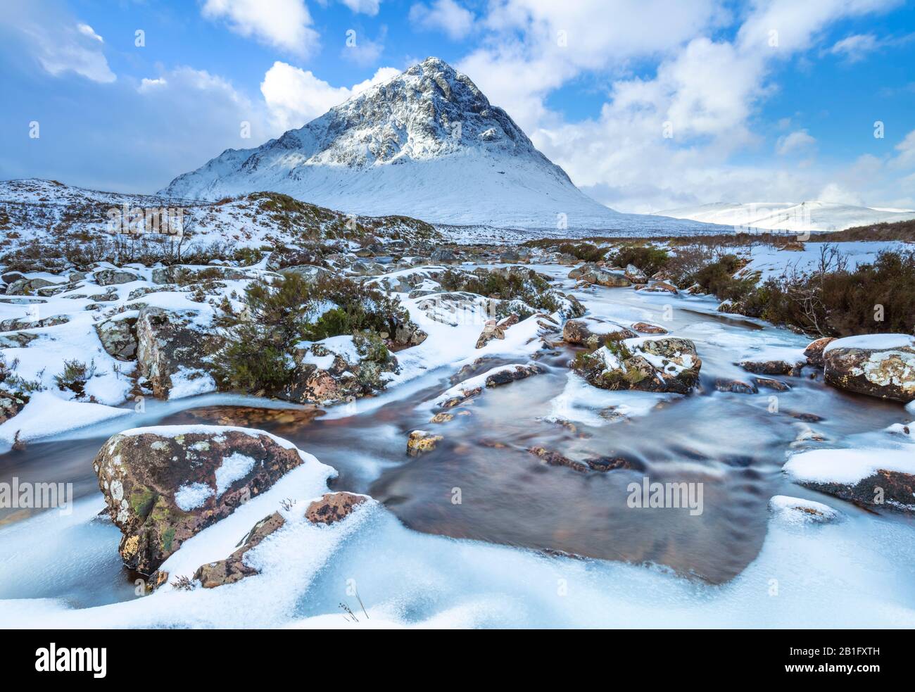 Snow covered Buachaille Etive Mor and the River Coupall Rannoch moor Glencoe Scottish Highlands Scotland UK GB  Europe Stock Photo