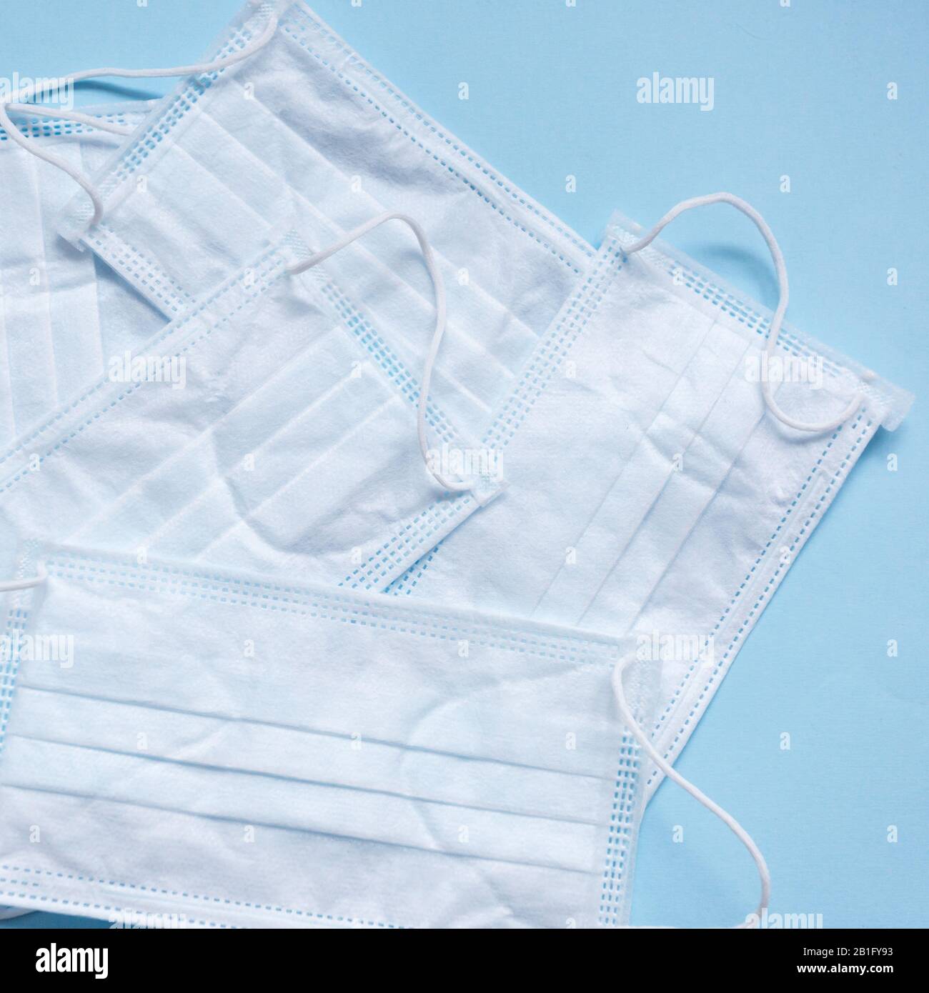 Blue medical masks hi-res stock photography and images - Alamy