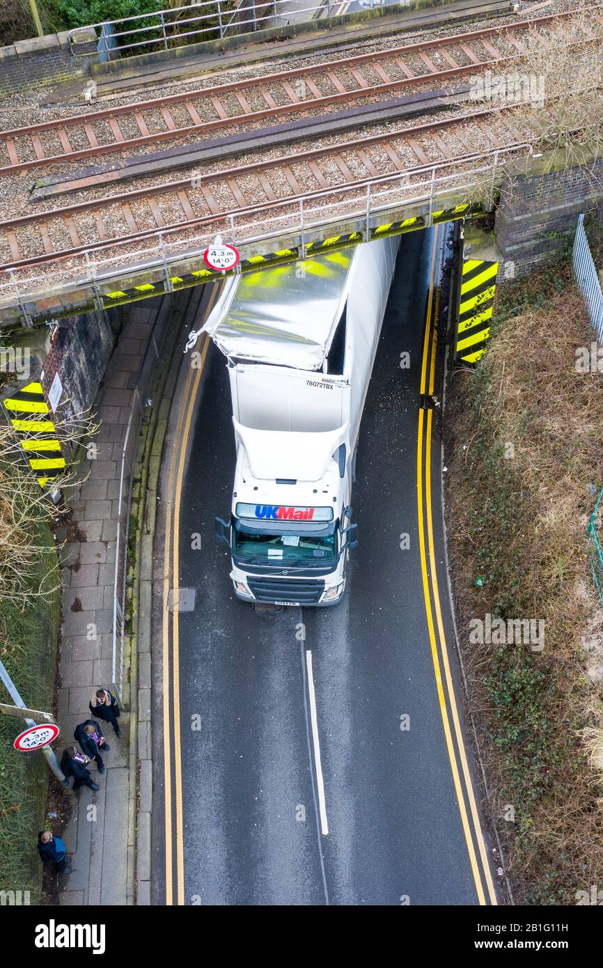 A lorry crashes into a railway bridge on the busy anchor road, a lorry stuck under a bridge, Stoke on Trent, HGV lorry crash, large haulage accident Stock Photo