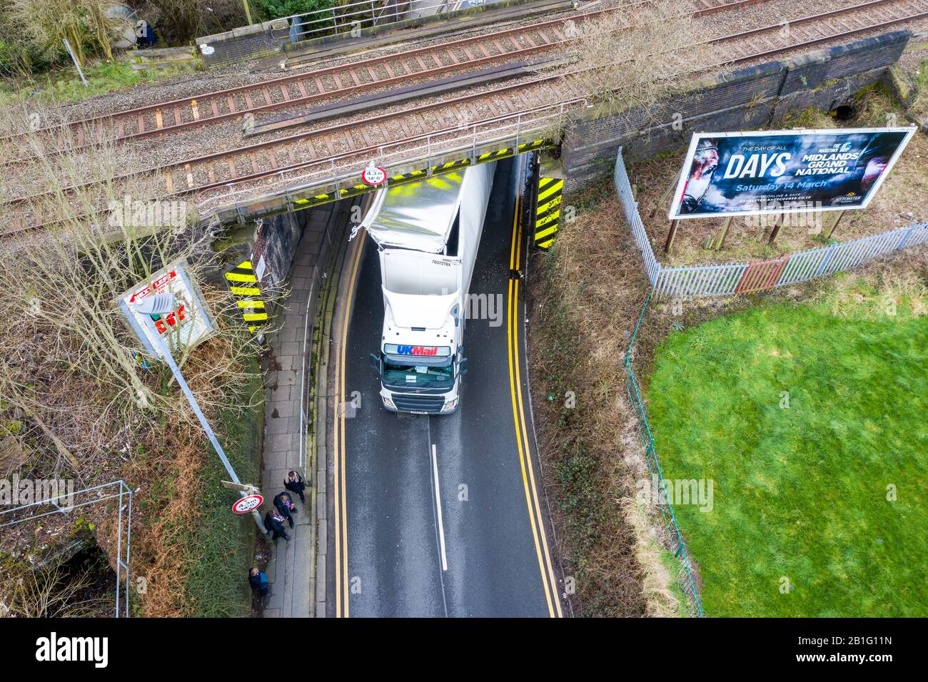 A lorry crashes into a railway bridge on the busy anchor road, a lorry stuck under a bridge, Stoke on Trent, HGV lorry crash, large haulage accident Stock Photo